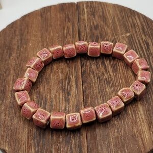 B2302 pink Goldstone finish‎ bracelet square beaded stretch